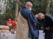 Koshin shaving the head of Anshin at Zen Ordination Ceremony