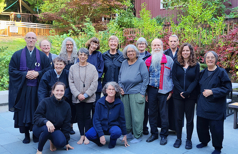 Koshin and a group of meditators standing outside after an all-day sit in West Seattle.